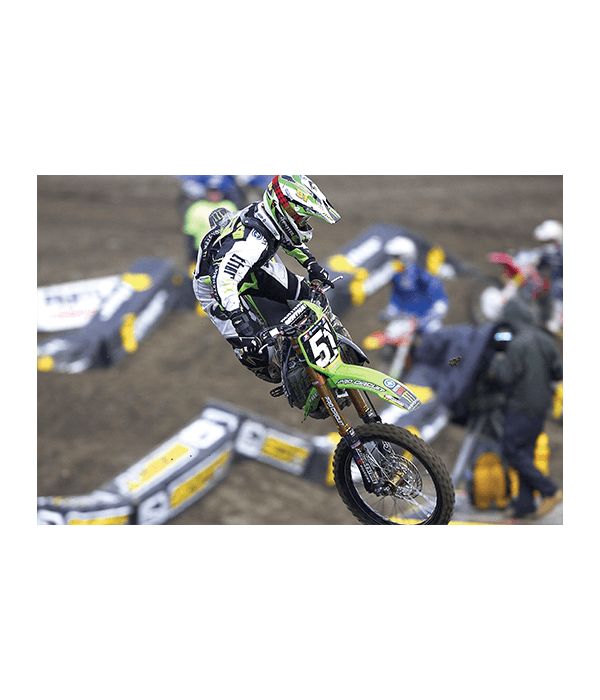 Ryan Villopoto jumping dirt bike at the AMA MX Championship.