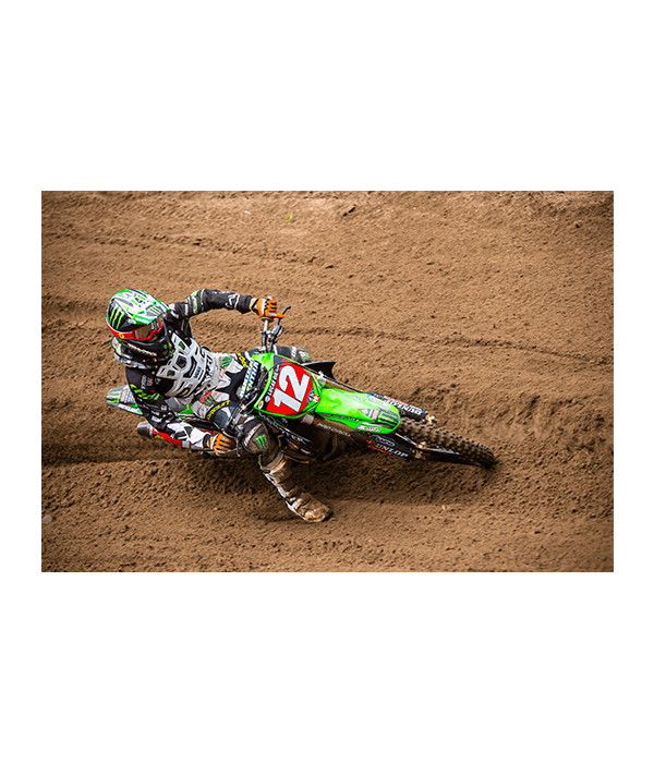 Blake Bagget sliding down the dirt bike track on the KX 250F.